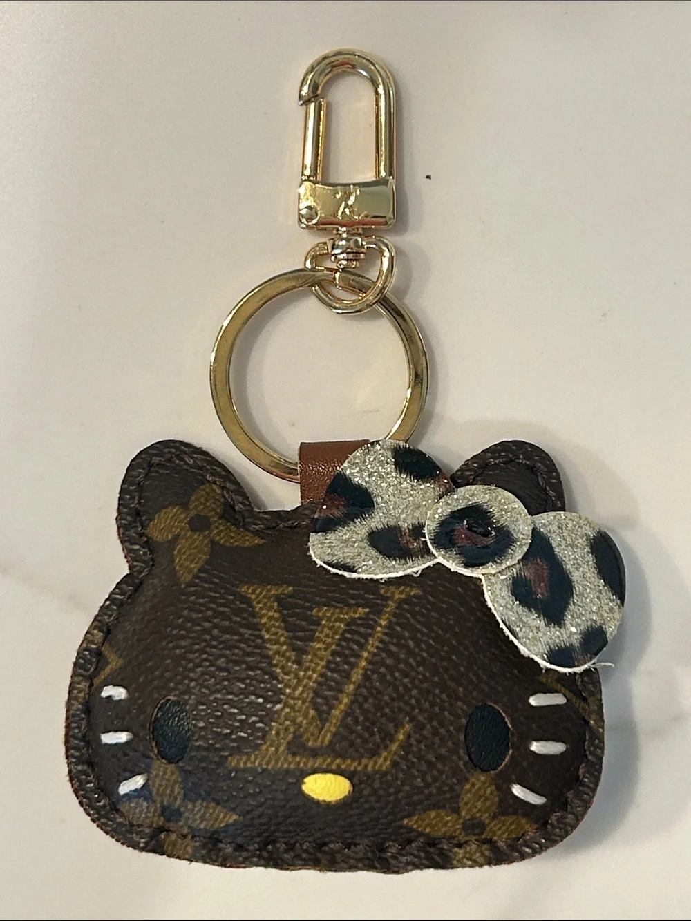 Upcycled LV Gold-Tone Brown Monogram HK Keychain Bag Charm with Leopard Bow